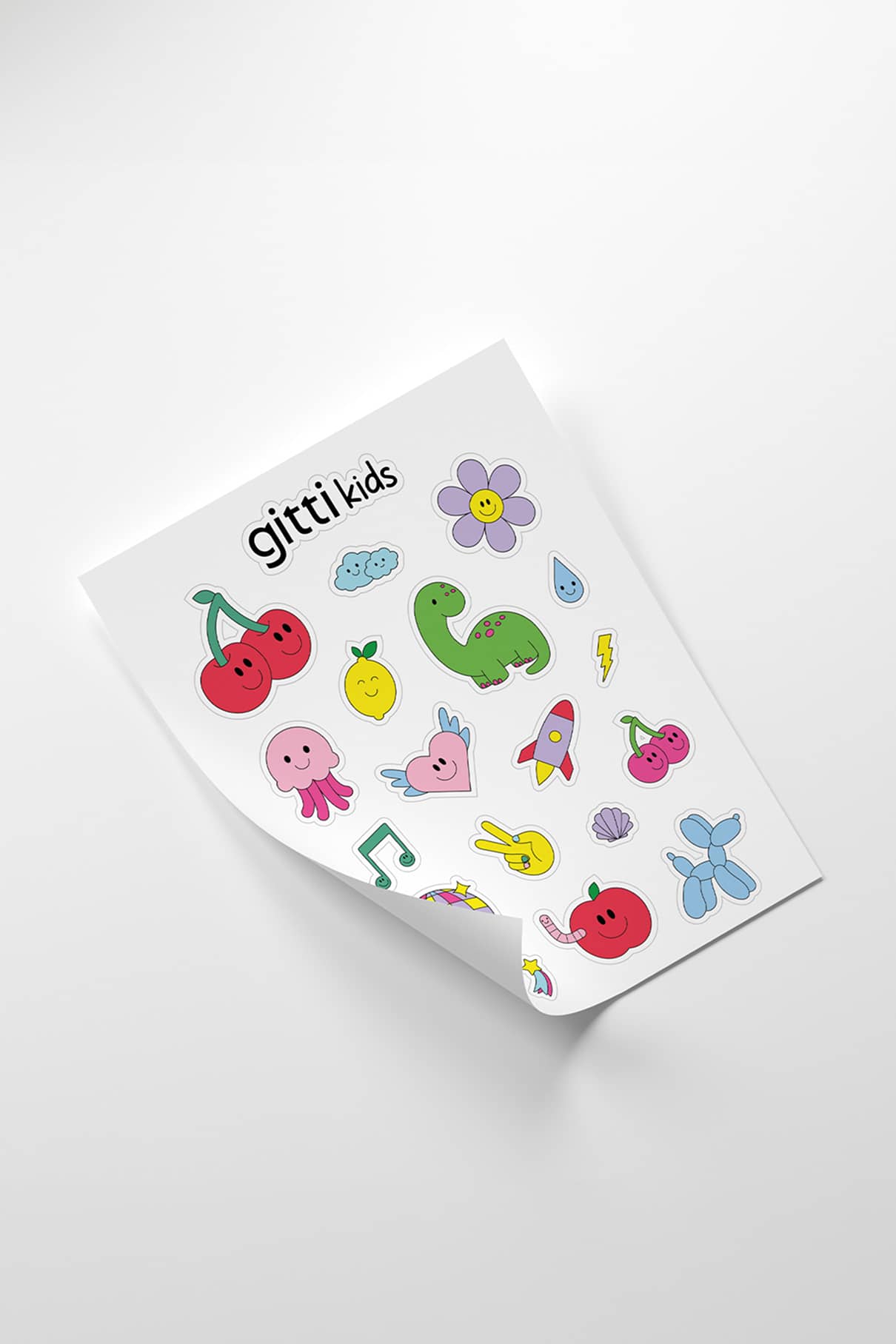 Der gitti kids Stickerbogen zeigt ein exklusives Design mit bunten Kirschen, Tieren, Blumen, Früchten und verspielten Motiven auf weißem Hintergrund.
